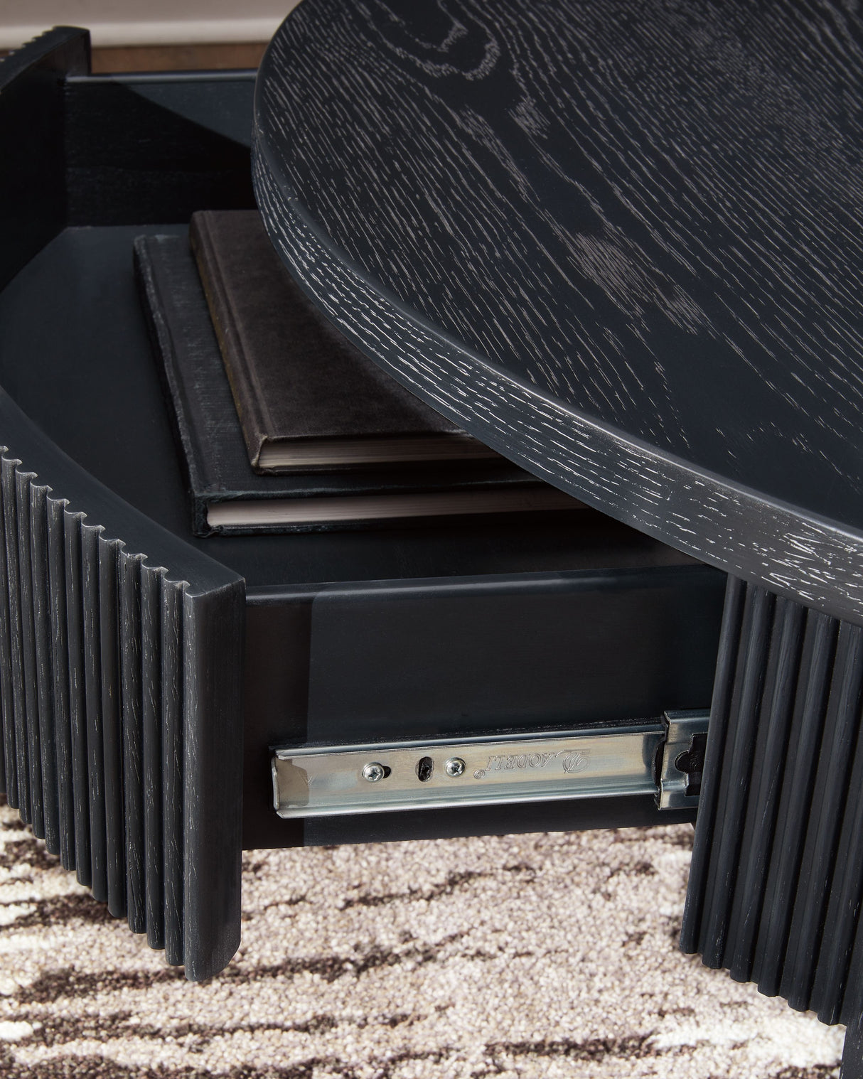 Marstream - Black - Round Cocktail Table by Signature Design by Ashley® | Bel Furniture