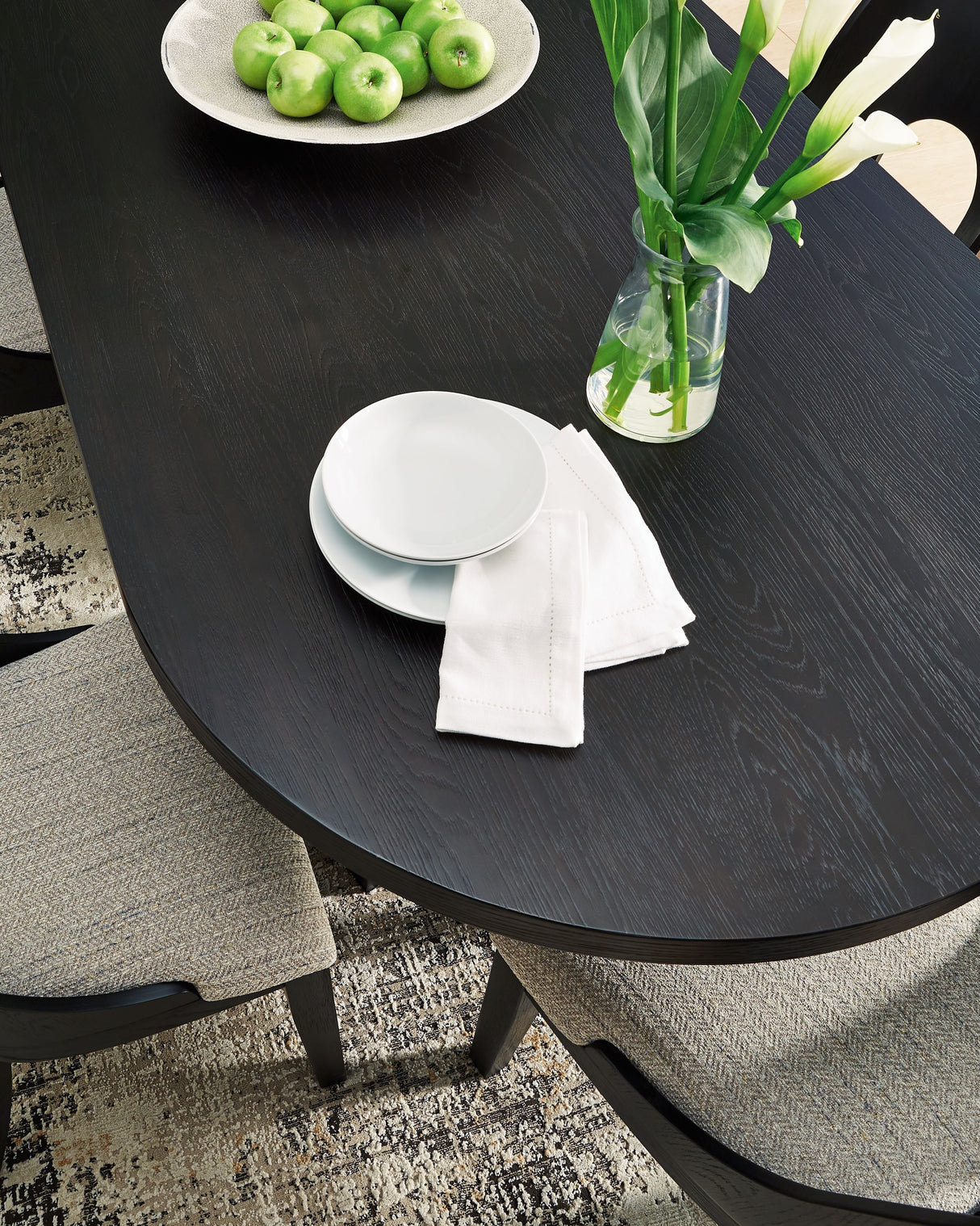 Rowanbeck - Black - Oval Dining Room Table by Signature Design by Ashley® | Bel Furniture