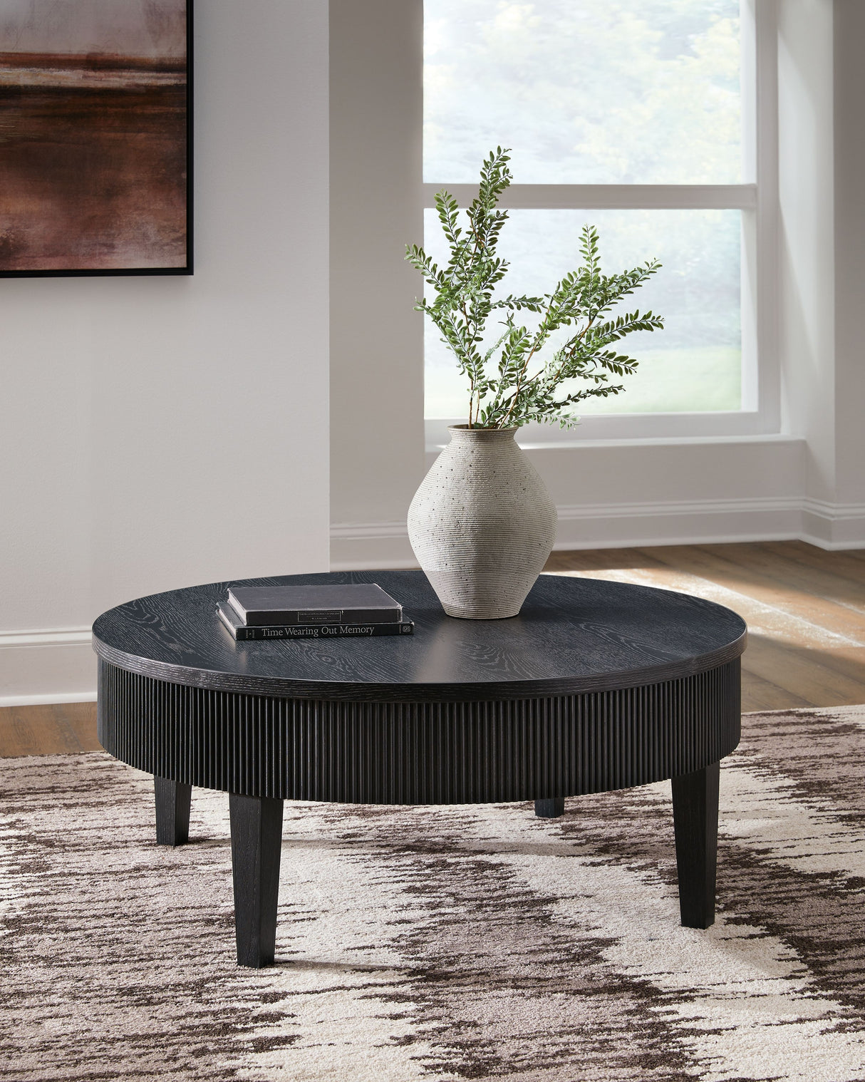 Marstream - Black - Round Cocktail Table by Signature Design by Ashley® | Bel Furniture