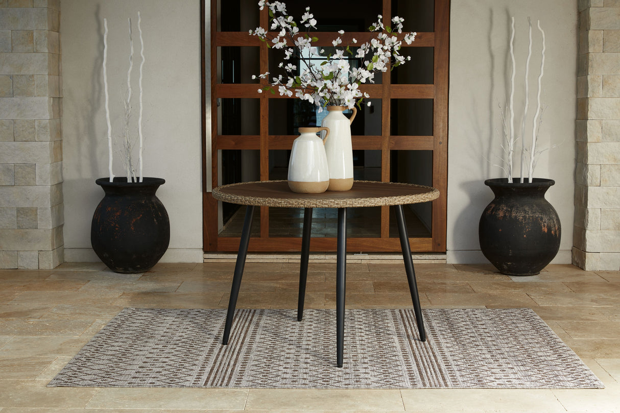 Amaris - Brown / Black - Round Dining Table by Signature Design by Ashley® | Bel Furniture