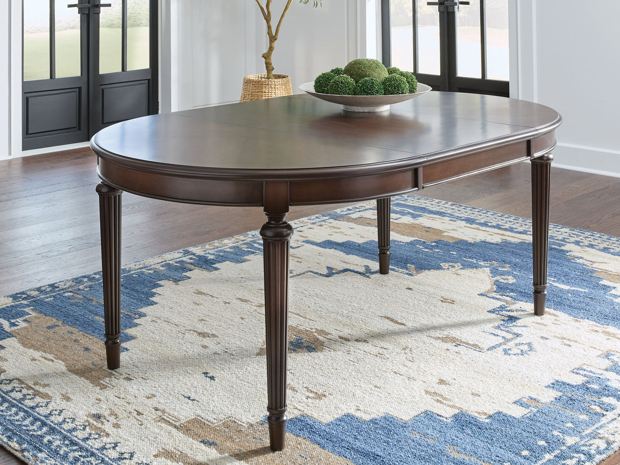 Lavinton - Brown - Oval Dining Room Extension Table by Signature Design by Ashley® | Bel Furniture