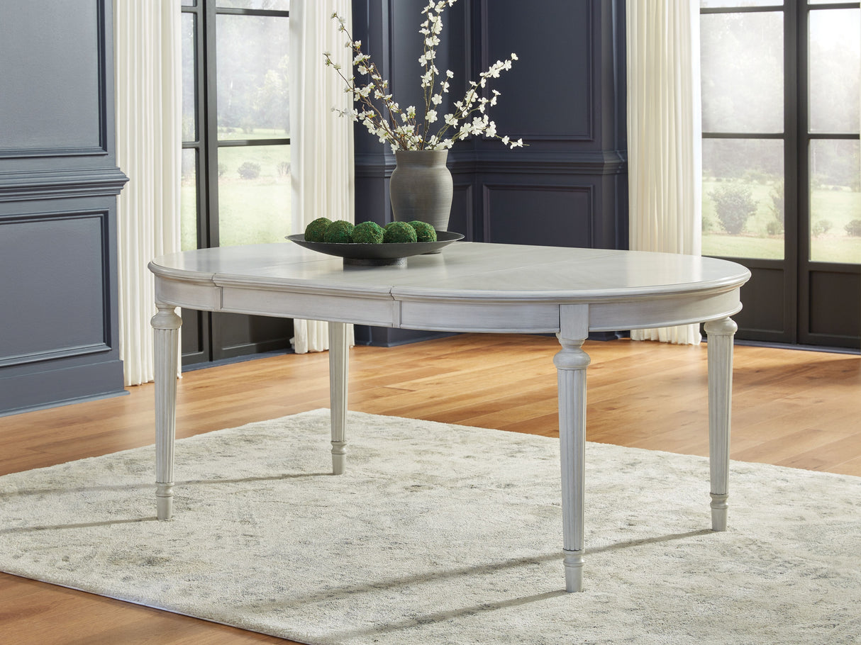 Montelaine - Antique White - Oval Dining Room Extension Table by Benchcraft® | Bel Furniture