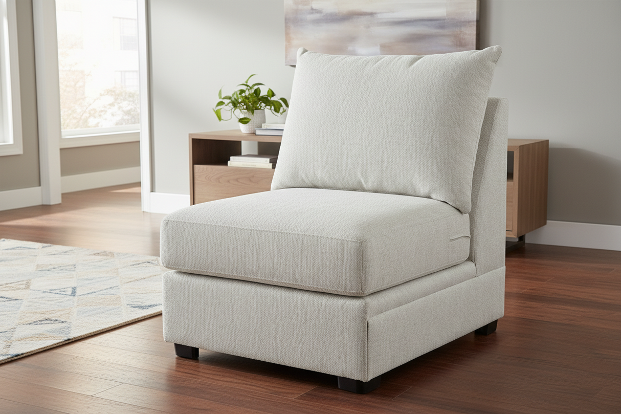 Light gray upholstered chair on a white background
