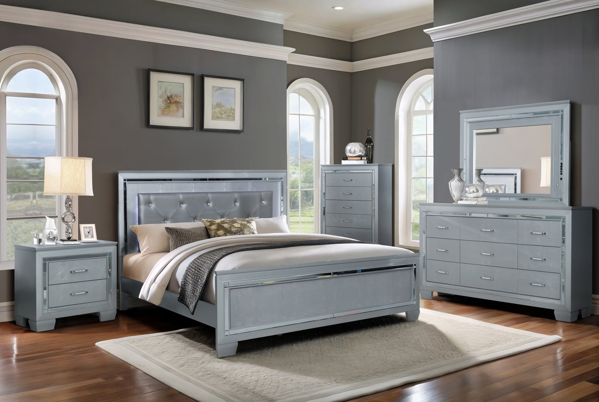 Gray bedroom set with bed, nightstands, and dresser in a room with gray walls and wooden flooring.