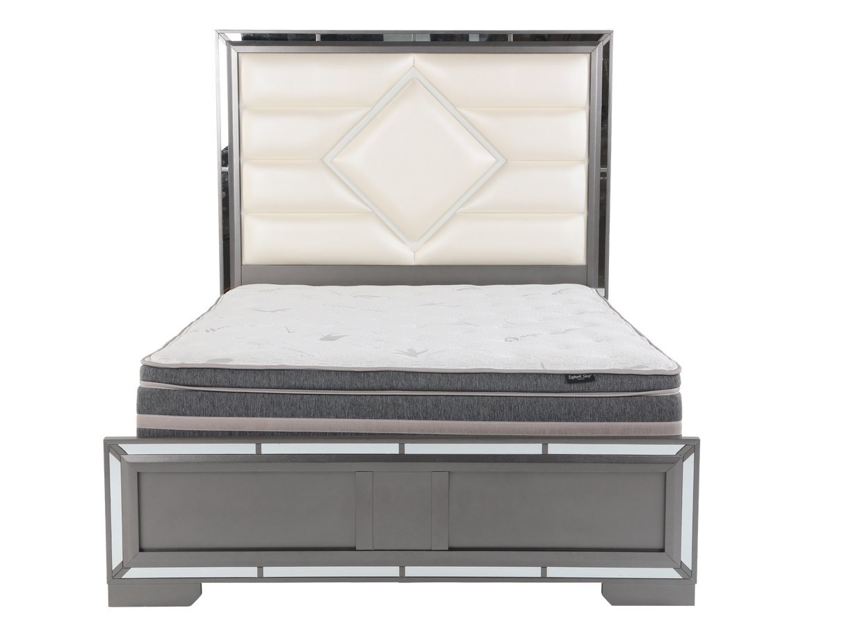 Gray upholstered bed with a diamond patterned headboard on a white background