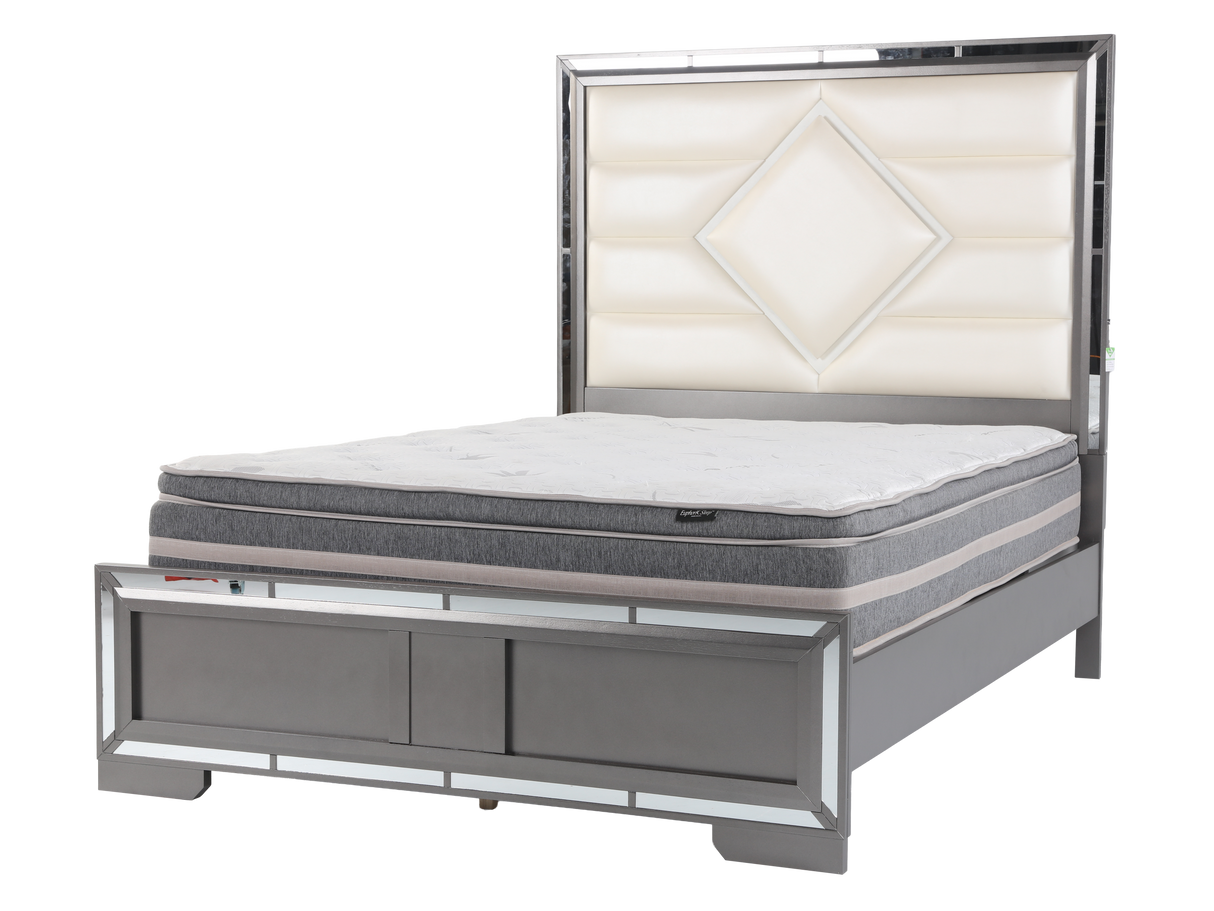 Silver bed frame with mattress on a white background