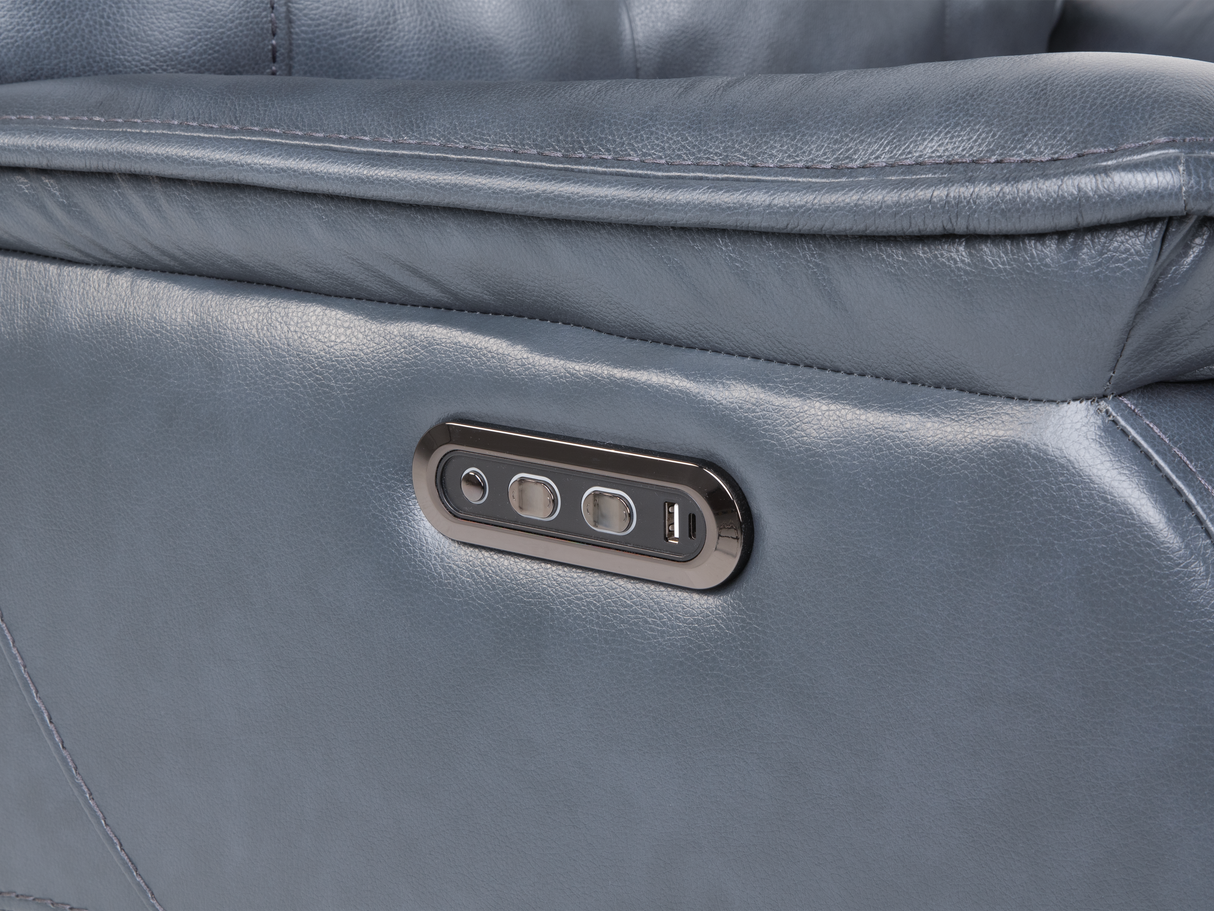 Close-up of a gray leather recliner with control panel.