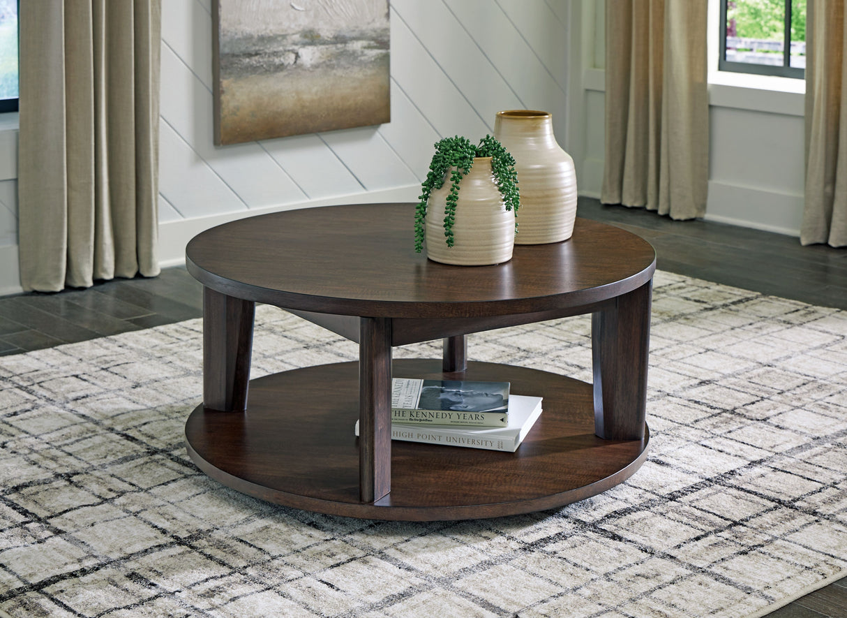 Korestone 2 - Dark Brown - Round Cocktail Table by Signature Design by Ashley® | Bel Furniture