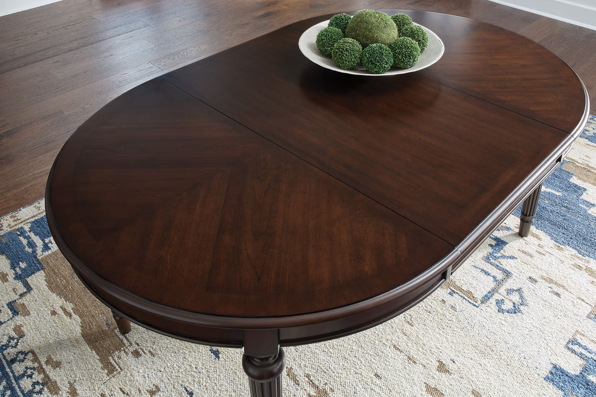 Lavinton - Brown - Oval Dining Room Extension Table by Signature Design by Ashley® | Bel Furniture