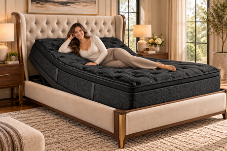 Woman testing a mattress on an adjustable bed base
