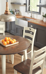 Woodanville - Round Dining Table Set by Signature Design by Ashley® | Bel Furniture