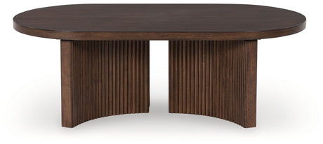 Korestone - Dark Brown - Oval Cocktail Table by Signature Design by Ashley® | Bel Furniture