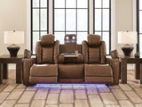 Gruaro - Power Reclining Sofa With Adjustable Headrest - Amber