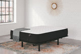 Limited Edition Firm innerspring mattress on black adjustable base with white brick bedroom - Bel Furniture