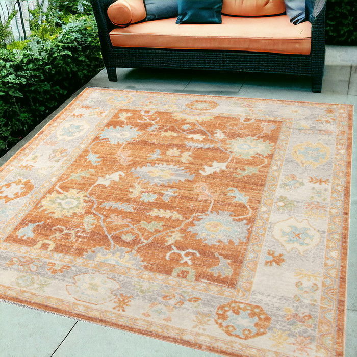 5' X 7' Floral Stain Resistant Indoor & Outdoor Area Rug - Blue / Orange