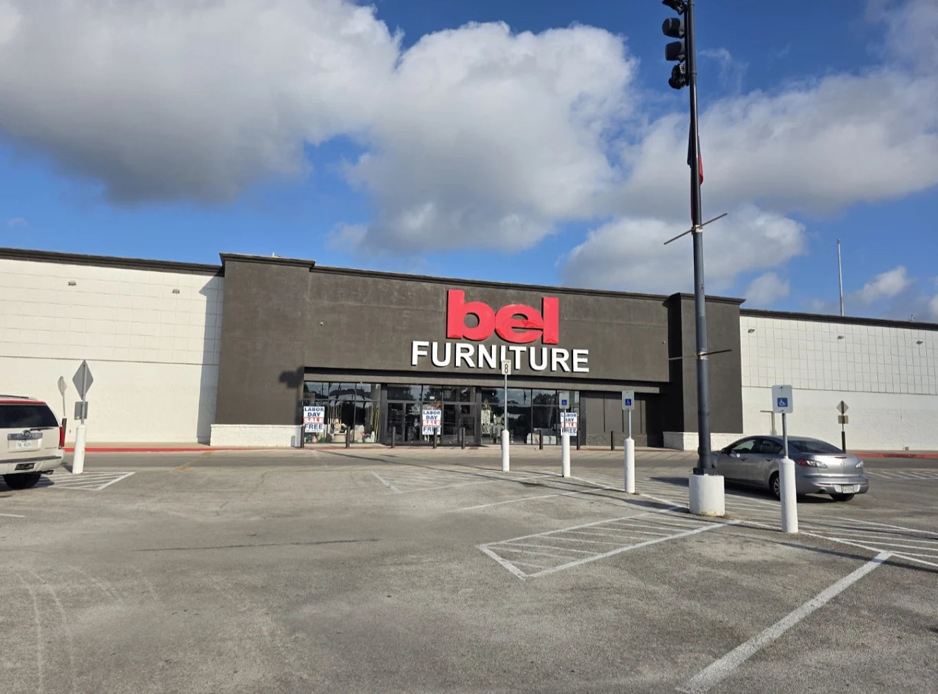 Bel Furniture store exterior with a clear sky