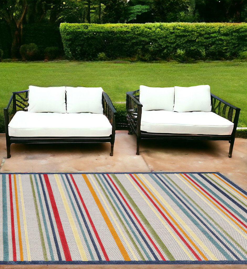 7' X 9' Striped Stain Resistant Indoor / Outdoor Area Rug - Ivory / Blue