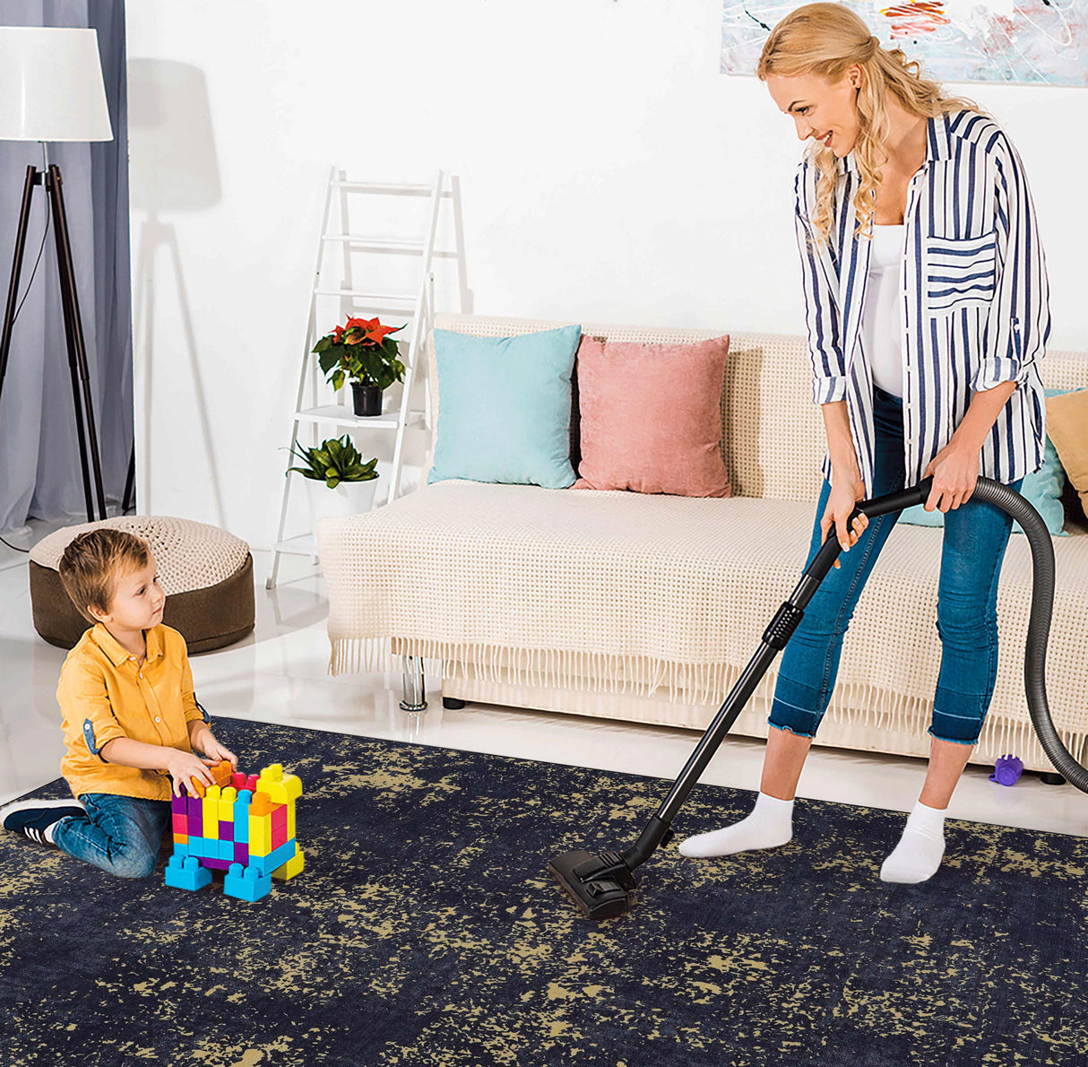 Maval - 6' X 9' Washable Area Rug - Black / Gold