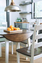 Woodanville - Round Dining Table Set by Signature Design by Ashley® | Bel Furniture