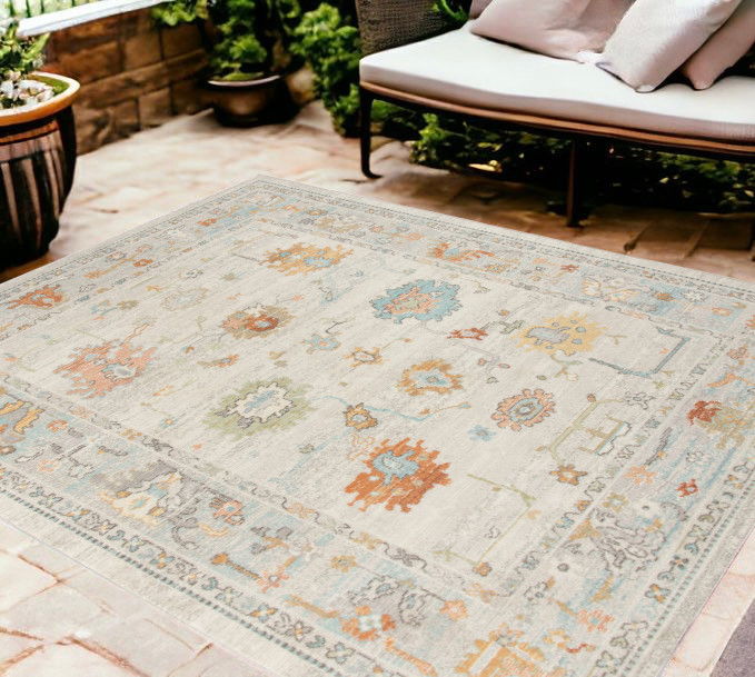 8' X 10' Floral Stain Resistant Indoor / Outdoor Area Rug - Blue / Orange