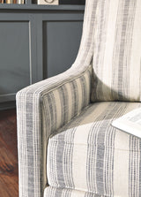 Kambria - Swivel Glider Accent Chair - Ivory / Black