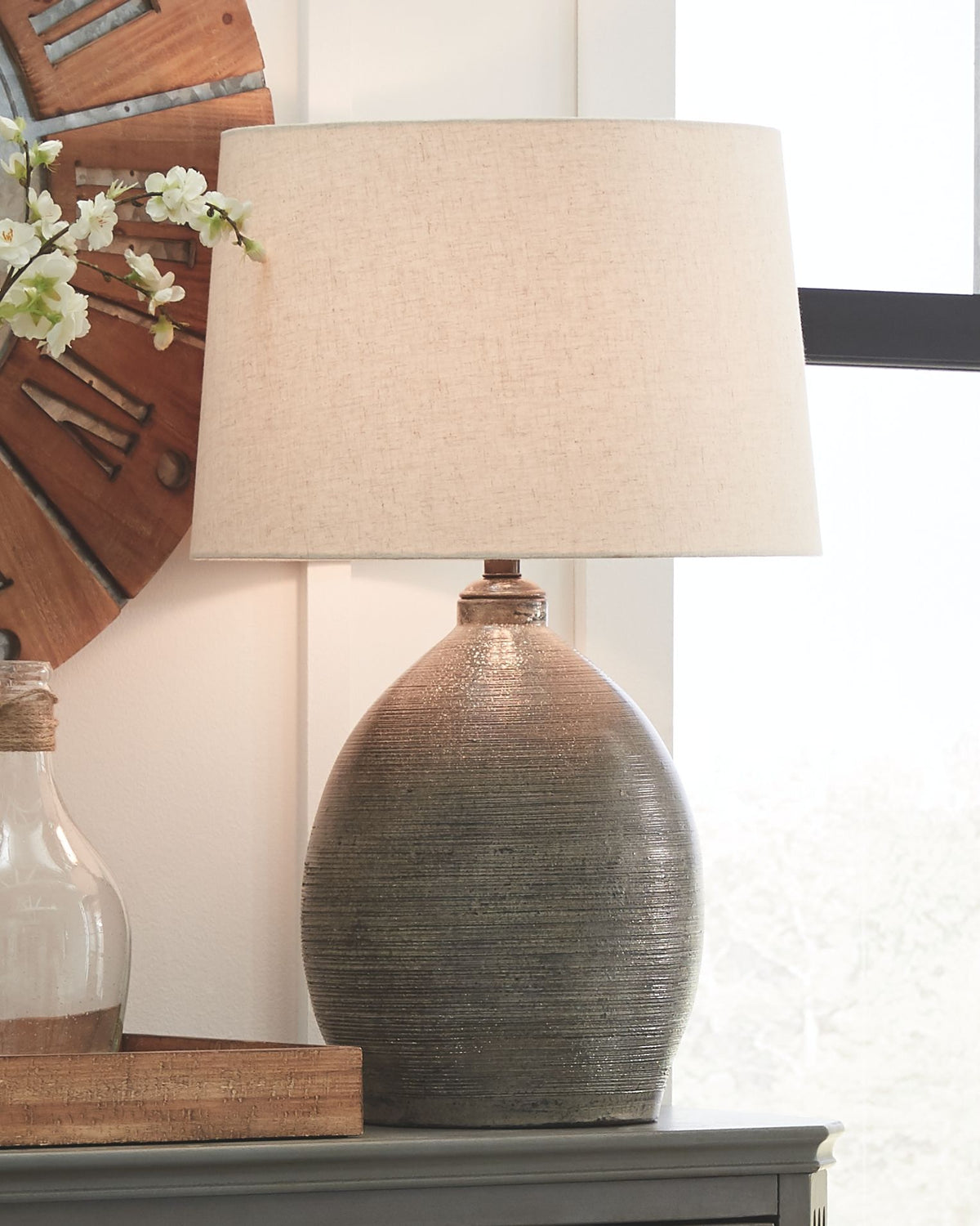 Joyelle - Gray - Terracotta Table Lamp by Signature Design by Ashley® | Bel Furniture
