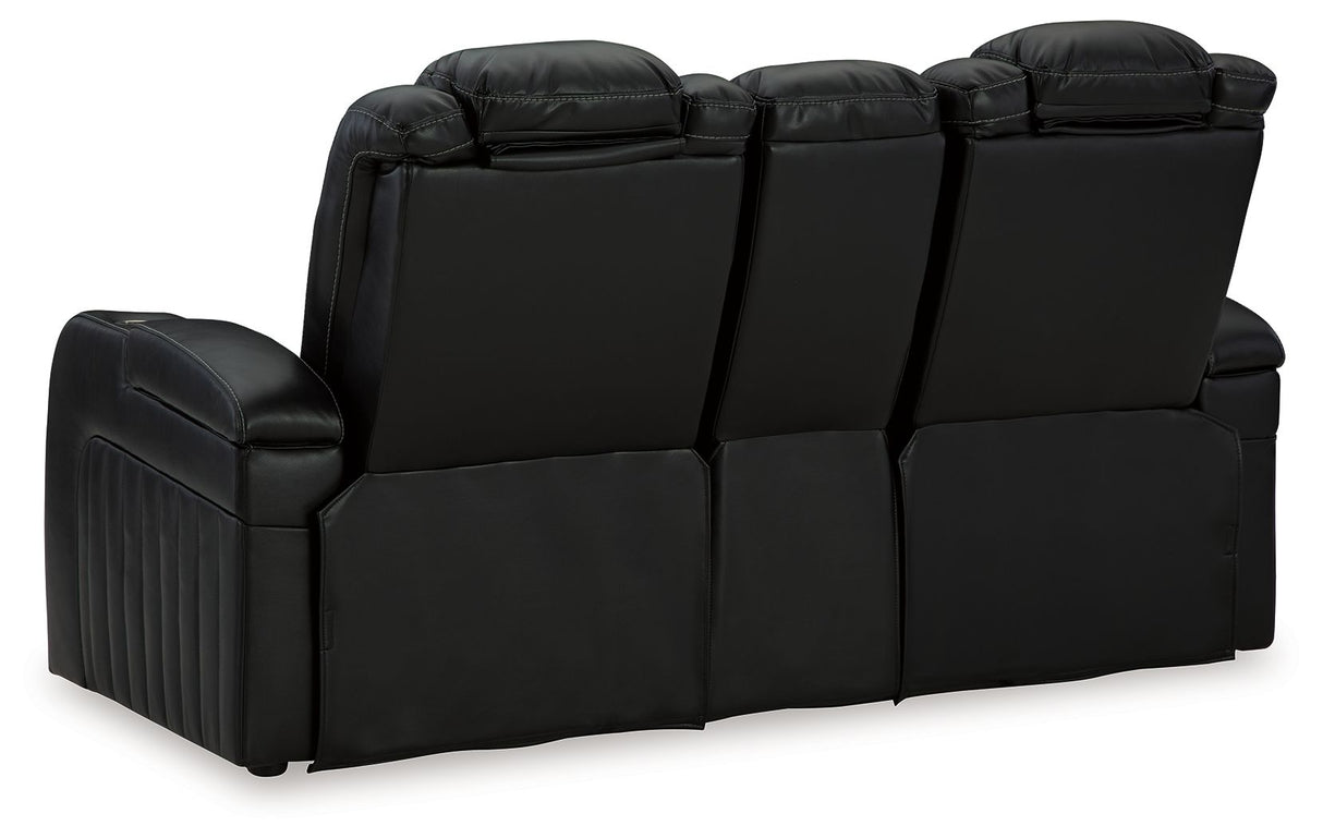 Caveman Den - Midnight - Power Reclining Loveseat with Console/ Adj Hdrst by Signature Design by Ashley® | Bel Furniture