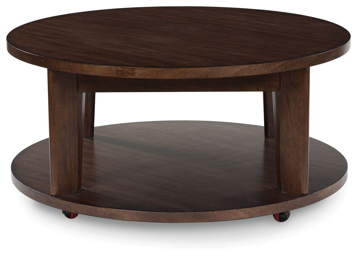 Korestone 2 - Dark Brown - Round Cocktail Table by Signature Design by Ashley® | Bel Furniture