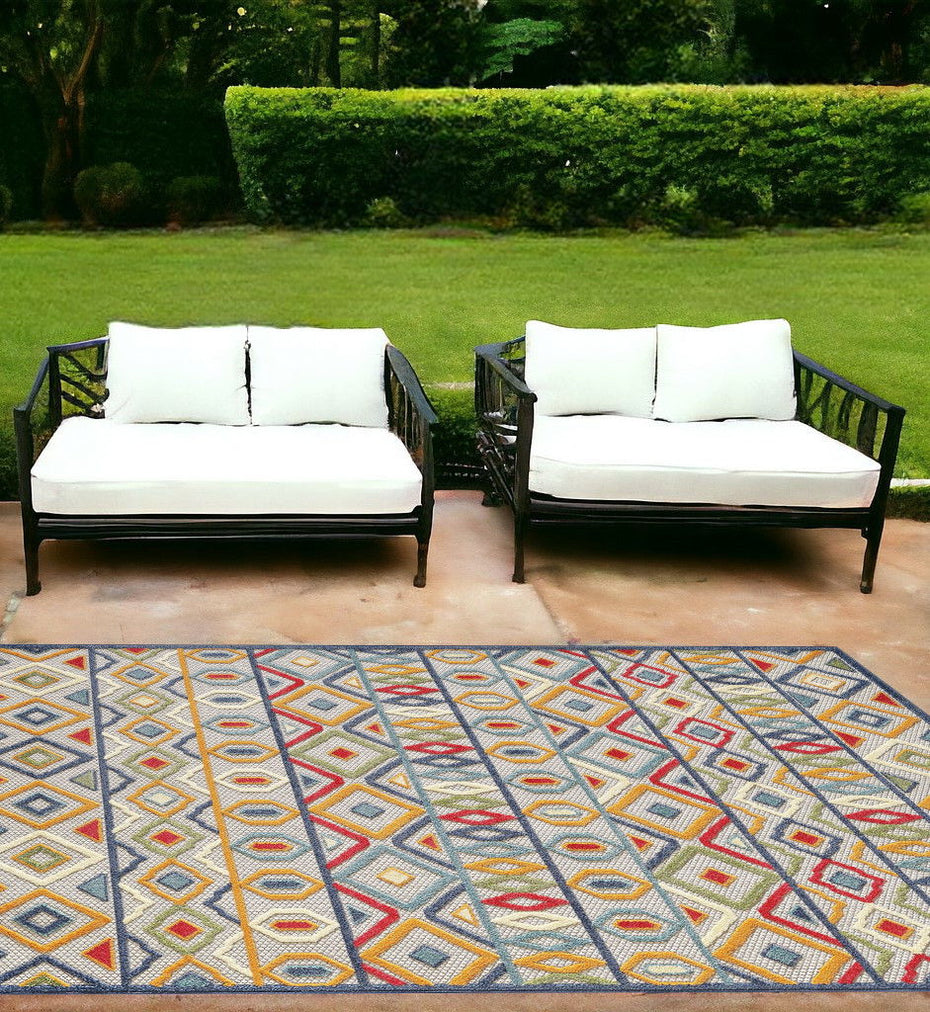 7' X 9' Southwestern Stain Resistant Indoor / Outdoor Area Rug - Ivory / Blue