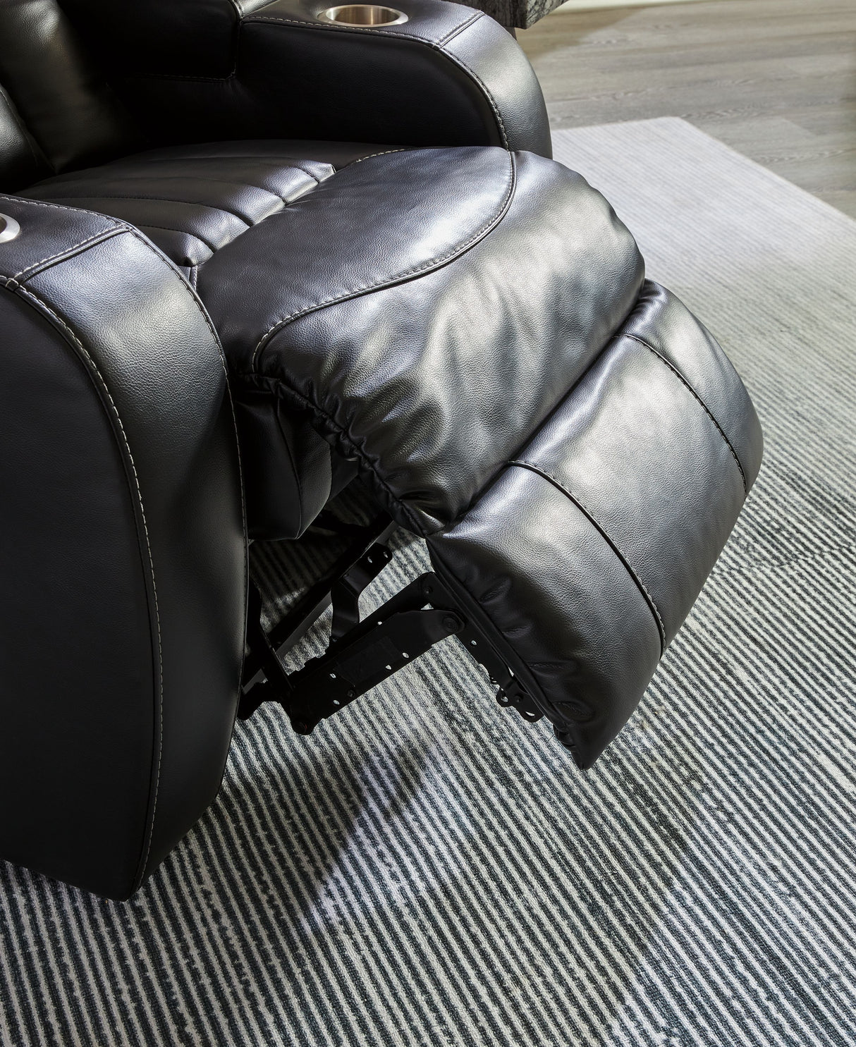 Caveman Den - Midnight - Power Reclining Loveseat with Console/ Adj Hdrst by Signature Design by Ashley® | Bel Furniture