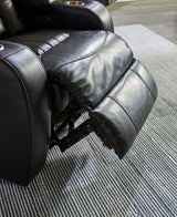Caveman Den - Midnight - Power Reclining Loveseat with Console/ Adj Hdrst by Signature Design by Ashley® | Bel Furniture