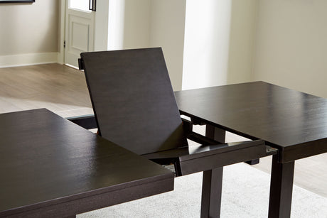 Neymorton - Dark Grayish Brown - Rectangular Dining Room Butterfly Extension Table by Signature Design by Ashley® | Bel Furniture