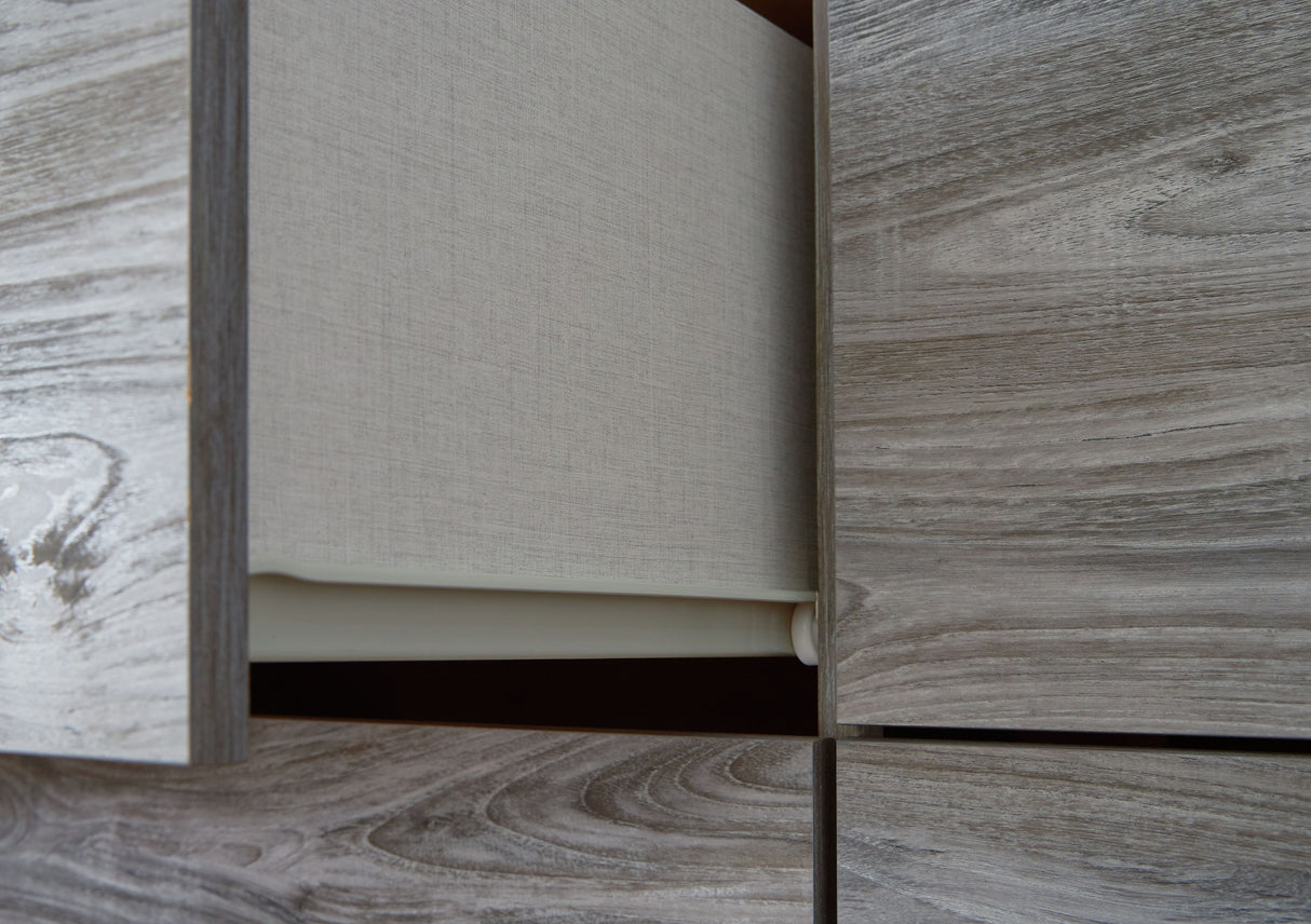 Bronyan - Dark Gray - Four Drawer Chest by Signature Design by Ashley® | Bel Furniture