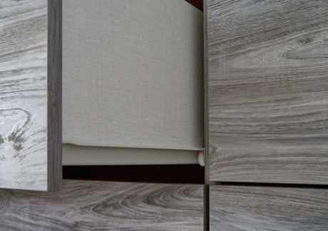 Bronyan - Dark Gray - Four Drawer Chest by Signature Design by Ashley® | Bel Furniture