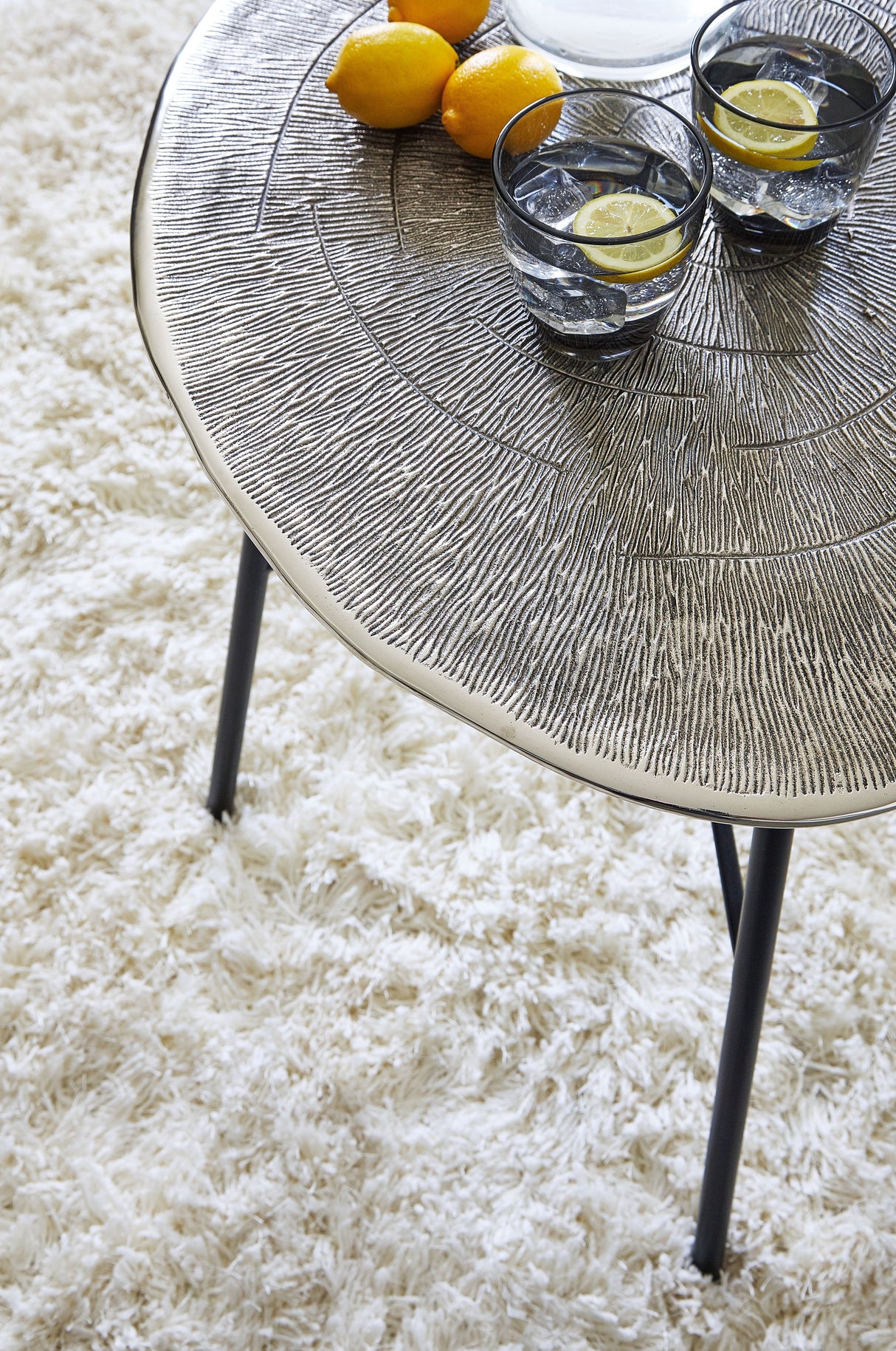 Laverford - Chrome / Black - Round End Table by Signature Design by Ashley® | Bel Furniture