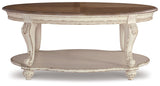 Realyn - Oval Cocktail Table - White / Brown