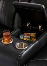 Caveman Den - Midnight - Power Reclining Loveseat with Console/ Adj Hdrst by Signature Design by Ashley® | Bel Furniture