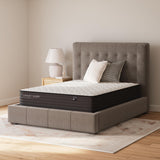 Sierra Sleep Limited Edition Firm innerspring mattress on gray upholstered bed frame with pillows - Bel Furniture