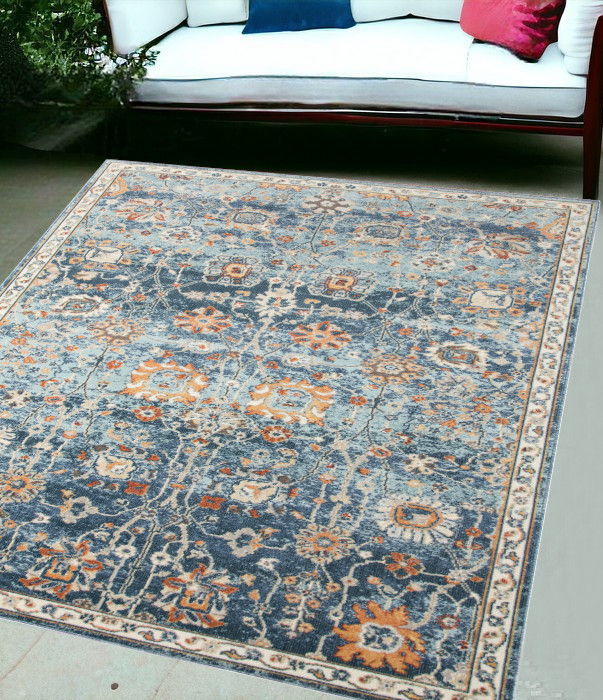 5' X 7' Floral Stain Resistant Outdoor & Indoor Area Rug - Blue / Orange