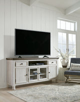 Havalance - Brown / Beige - Extra Large TV Stand - 4 Doors by Signature Design by Ashley® | Bel Furniture