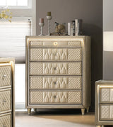 A luxury bedroom furniture set featuring a tufted cream upholstered bed, matching nightstands, a dresser with an in-bed fireplace, a tall chest, and a large mirror, all in a modern gray and beige bedroom setting.