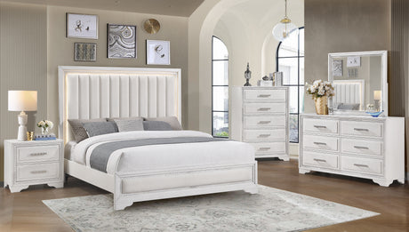 White bedroom set with bed, nightstands, dresser, and mirror in a room.