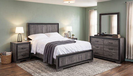 Modern bedroom with wooden furniture, including a bed, nightstands, and dresser.