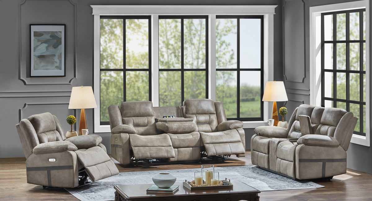 Gray reclining sofa set in a living room with large windows.