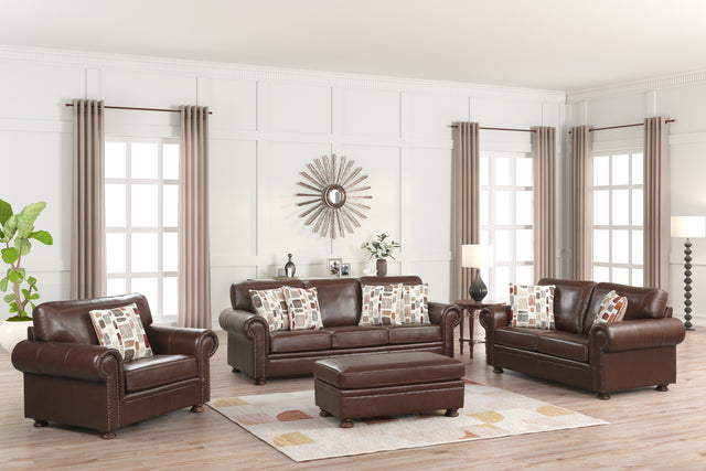 Brown leather sofa set with patterned cushions in a living room setting.