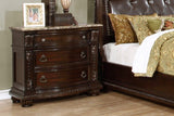 Luxury bedroom set with dark wood furniture including a bed, dresser, and nightstands.