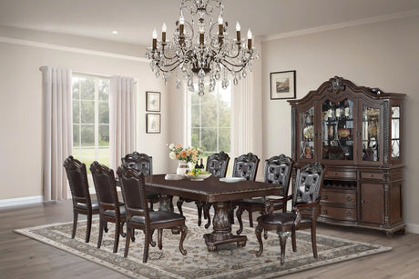 Dining room with wooden table and chairs, crystal chandelier, and a large china cabinet.