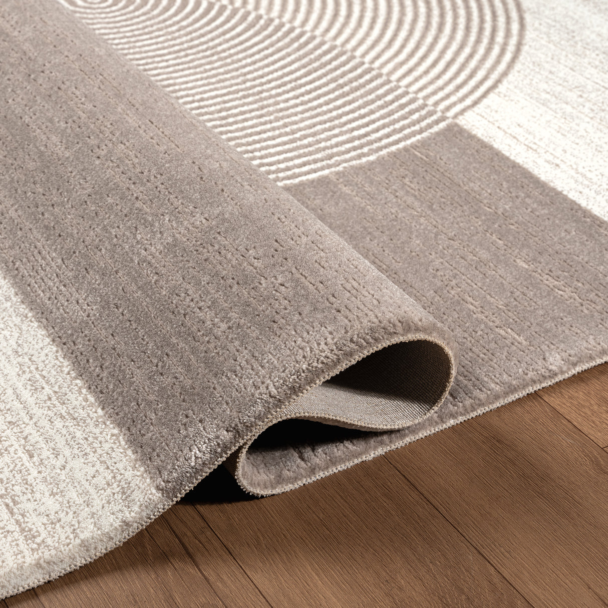 .Nubia Brown Power-Loomed Area Rug - 6' 6" x 9' 0"