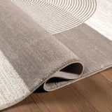 .Nubia Brown Power-Loomed Area Rug - 6' 6" x 9' 0"