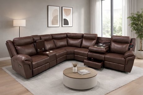 Brown leather sectional sofa in a living room setting with a round wooden coffee table.